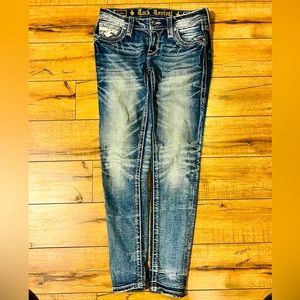 Woman’s Rock Revival cellis skinny jeans.